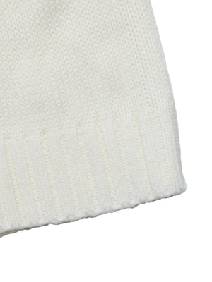 pullover sweater in cream with ribbed cuffs and hip-length