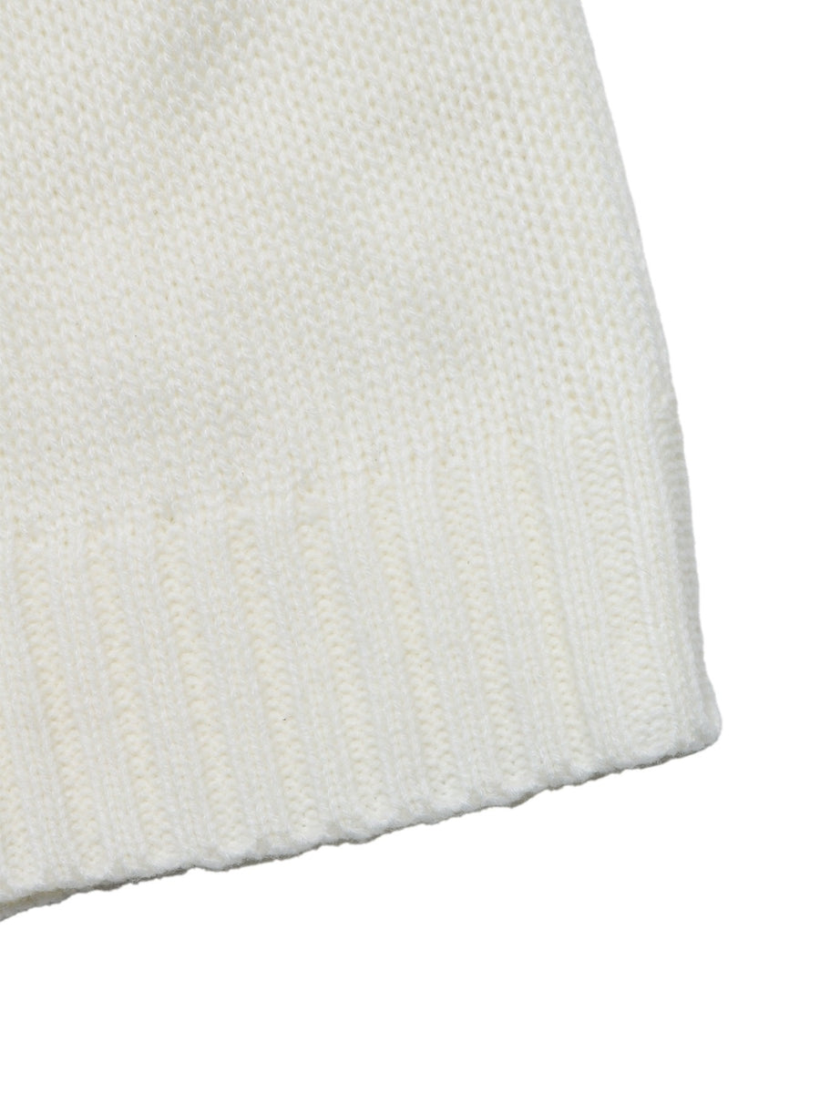 pullover sweater in cream with ribbed cuffs and hip-length