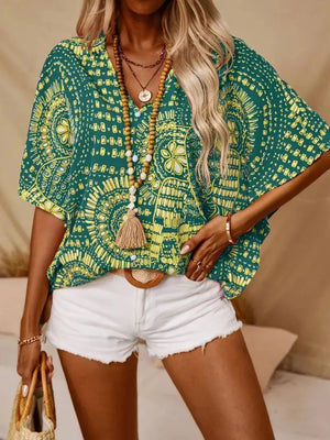 Bohemian print green v-neck t-shirt with short sleeves and a relaxed fit.