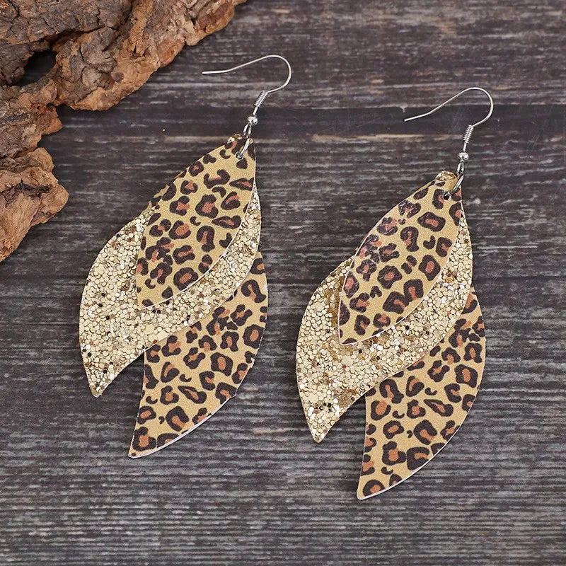 Leopard print layered drop earrings in gold with glitter accents