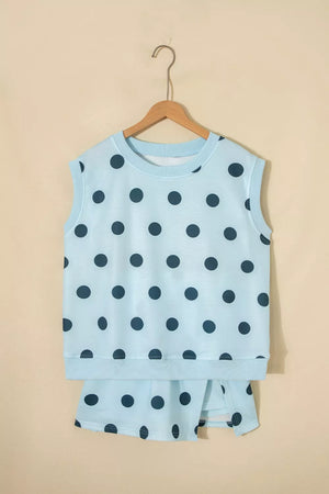 Pastel blue polka dot sleeveless crew neck top with matching skort.