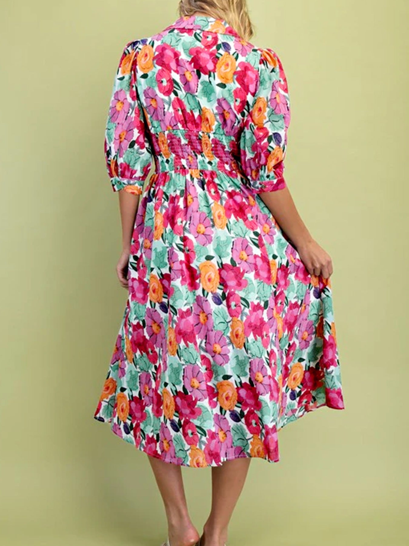Floral V-neck midi dress with smocked waist and puff sleeves in cotton.