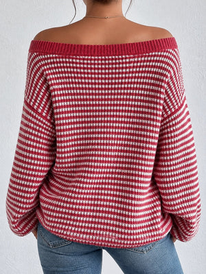 white pullover sweater featuring oversized and striped