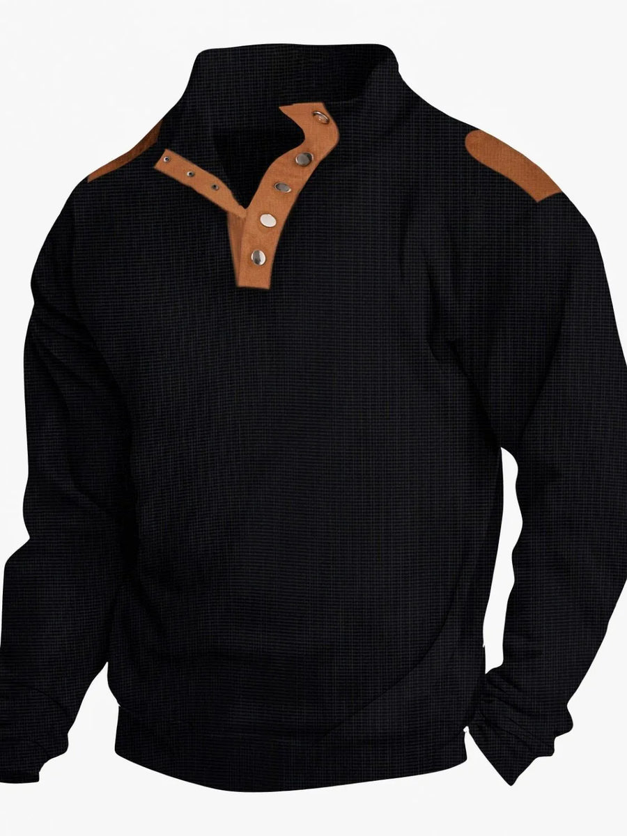 Black waffle knit henley shirt with tan suede shoulder patches and collar accents.