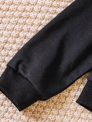 Black crew neck sweatshirt with ribbed cuffs and hem detail