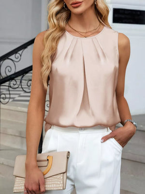 Apricot pleated round neck sleeveless tank top with a satin sheen.