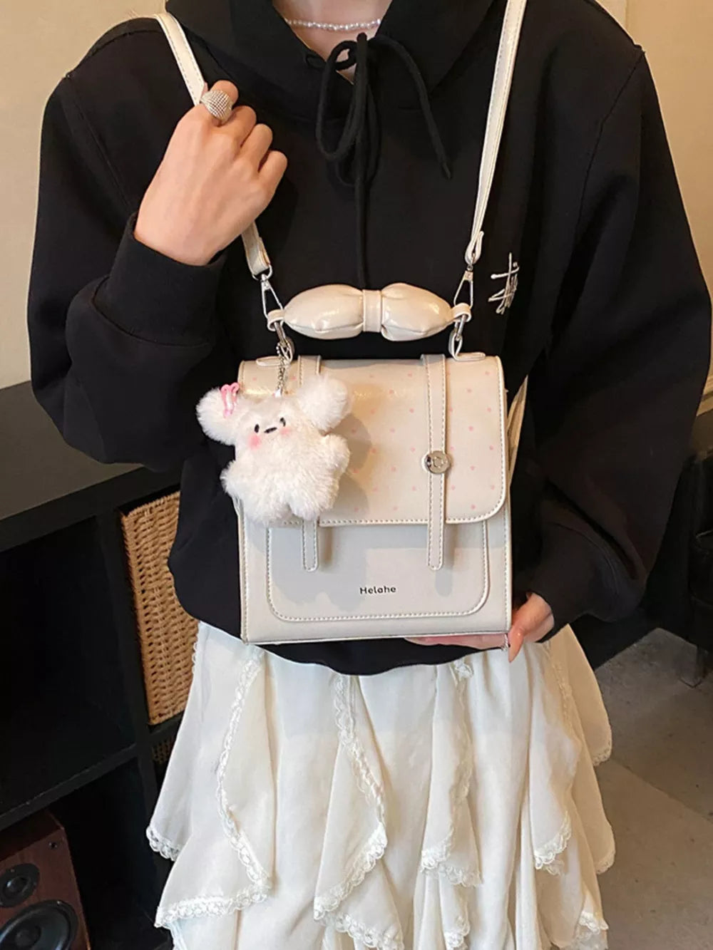 backpack in Cream White with polka dot and flap closure