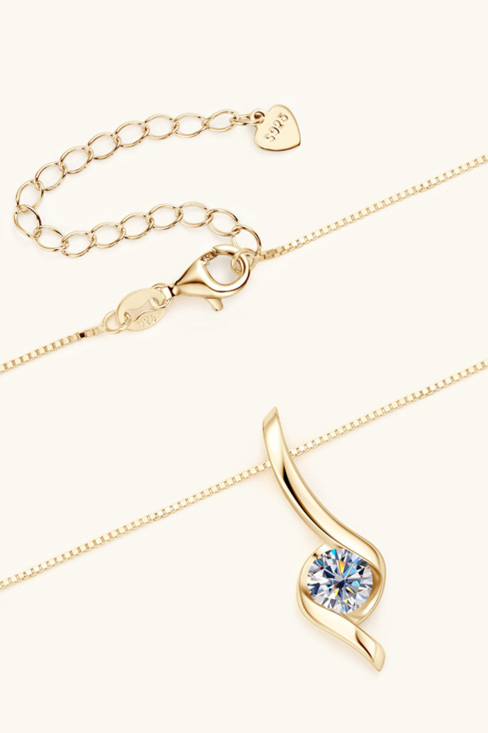 Gold moissanite pendant necklace with 925 sterling silver chain and adjustable clasp.