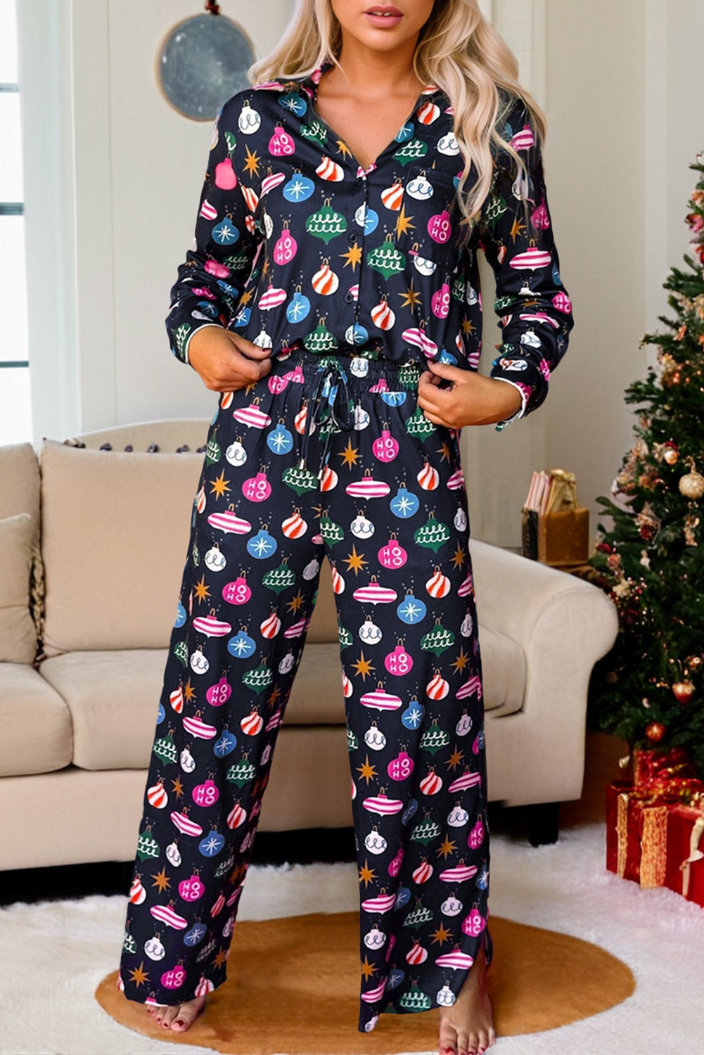Navy blue lounge set with festive bauble print, long sleeves, and drawstring pants.