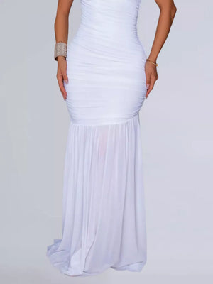 White ruched bodycon maxi dress with sheer flowing skirt detail.