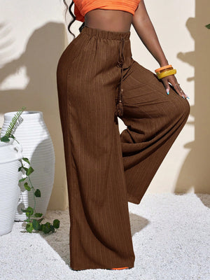 wide-leg pants in White with drawstring waist and full-length