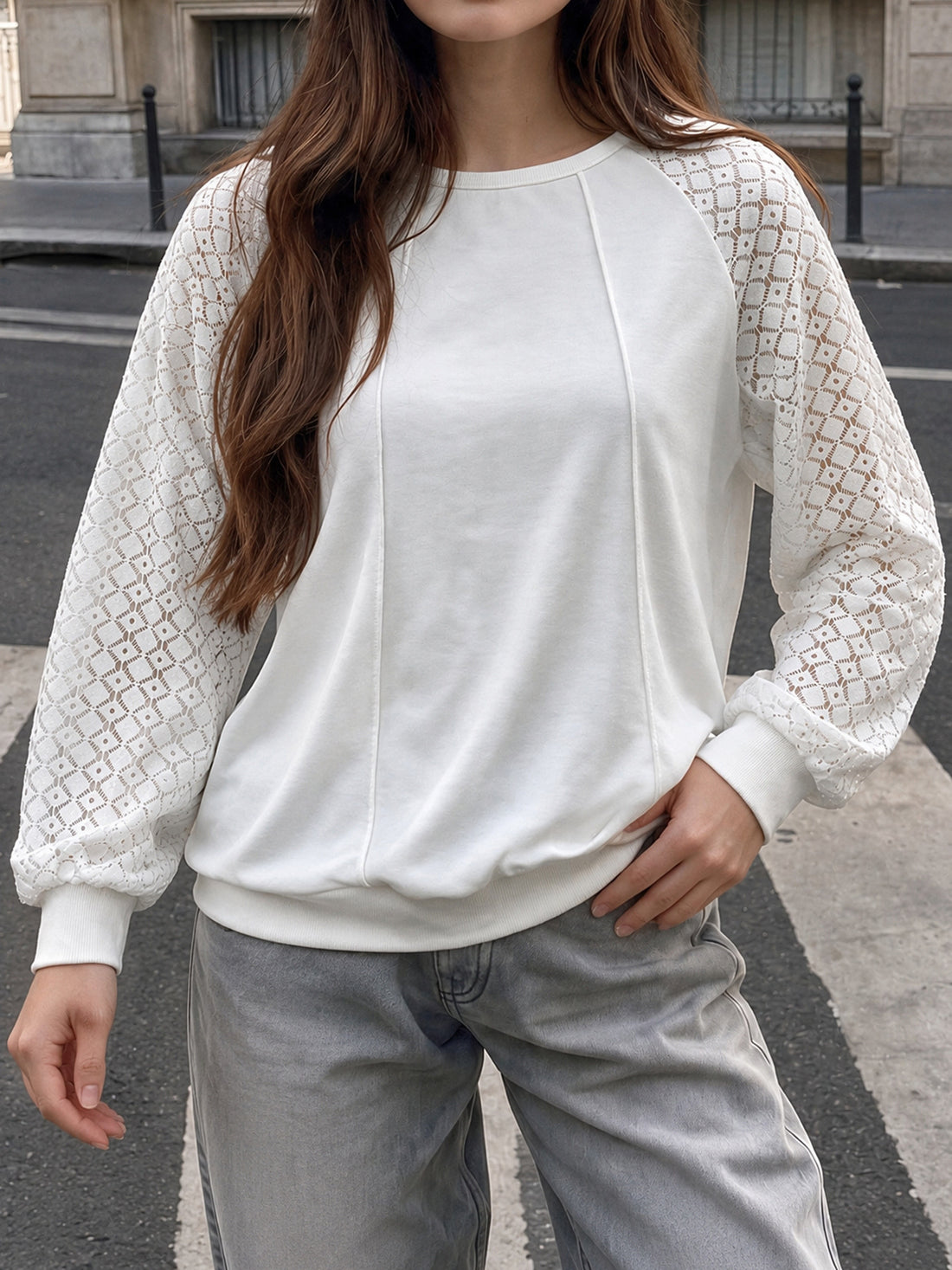 white sweatshirt with geometric and crew neck