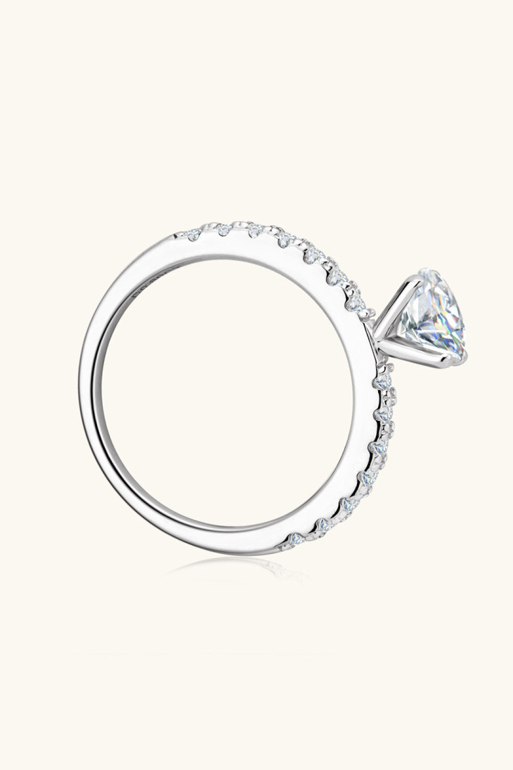 Silver moissanite statement ring with pavé band on sterling silver band.
