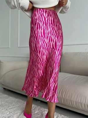 Pink zebra print satin midi skirt with a slight flare hem.
