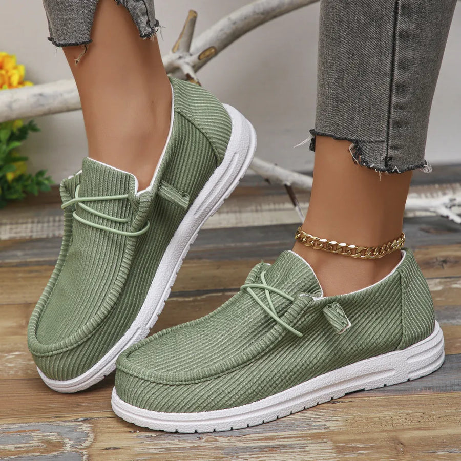 Textured slip-on espadrille sneakers in Matcha Green with white soles.