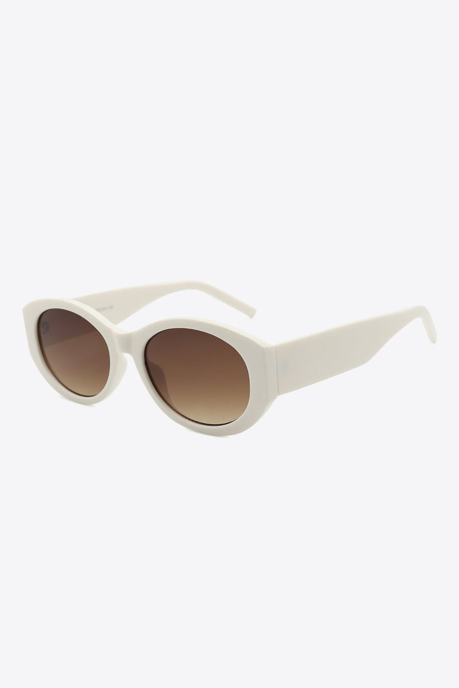 Sculpted oval frame sunglasses in beige with brown gradient lenses.