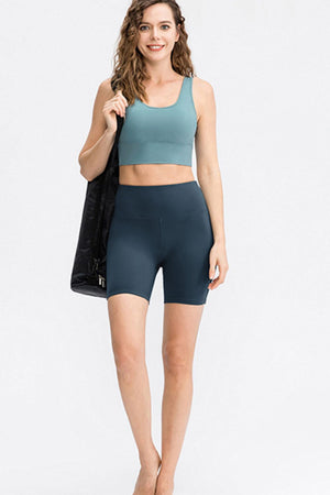 Deep Teal bike shorts with mesh insets and a high waist.