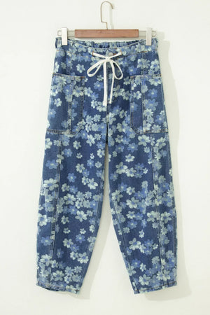Floral drawstring barrel jeans with pockets in blue denim, featuring a cropped length and daisy pattern.