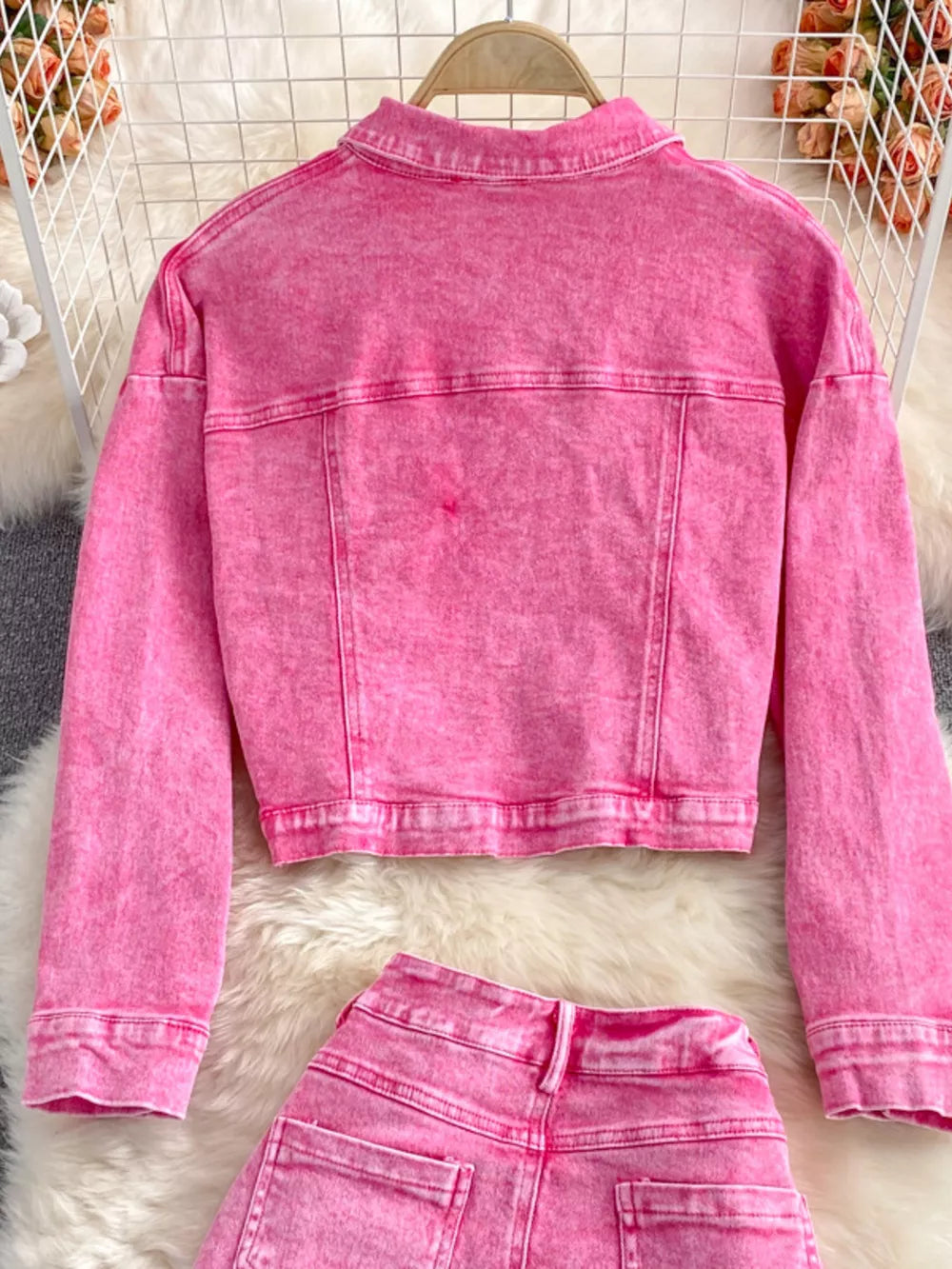 Pink acid wash denim jacket and shorts set, cropped jacket with button details.