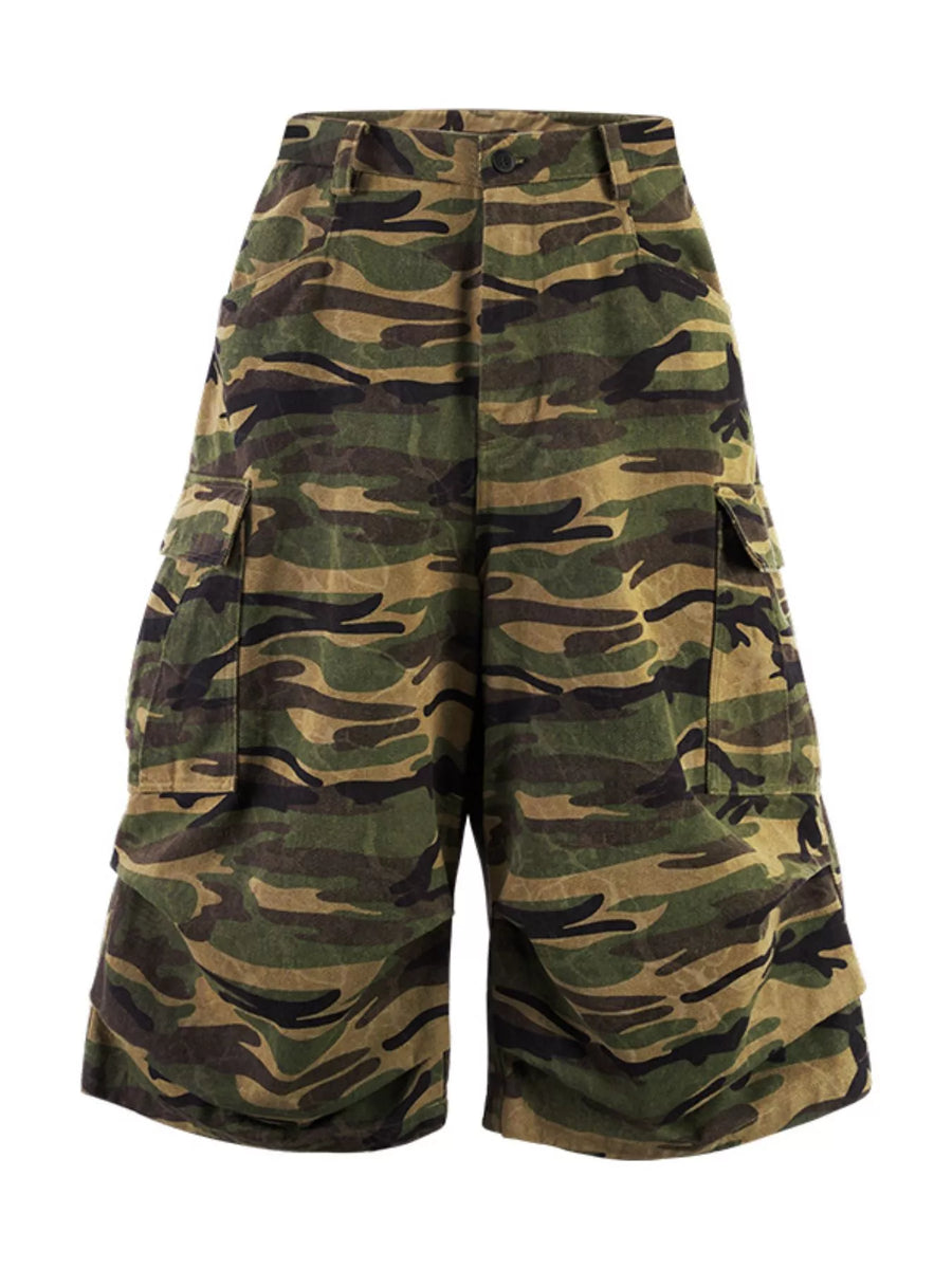 Oversized cotton camo cargo shorts in olive brown with multiple pockets.