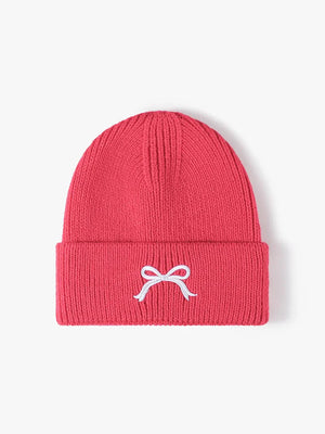 Strawberry ribbed knit beanie with embroidered white bow detail