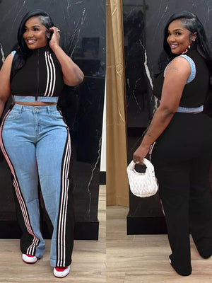 Black zip-front crop top with contrast trim and wide-leg pants with side stripes.
