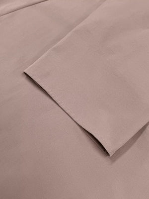 Dusty pink lightweight open front cardigan sleeve detail with clean stitching.