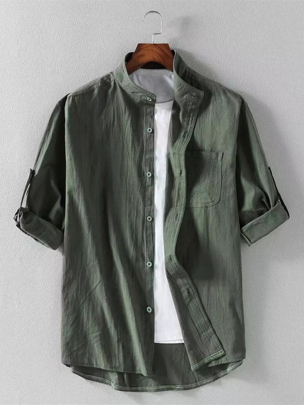 Men's army green band collar button-up shirt with rolled sleeves and chest pocket.