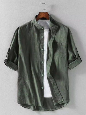 Men's army green band collar button-up shirt with rolled sleeves and chest pocket.