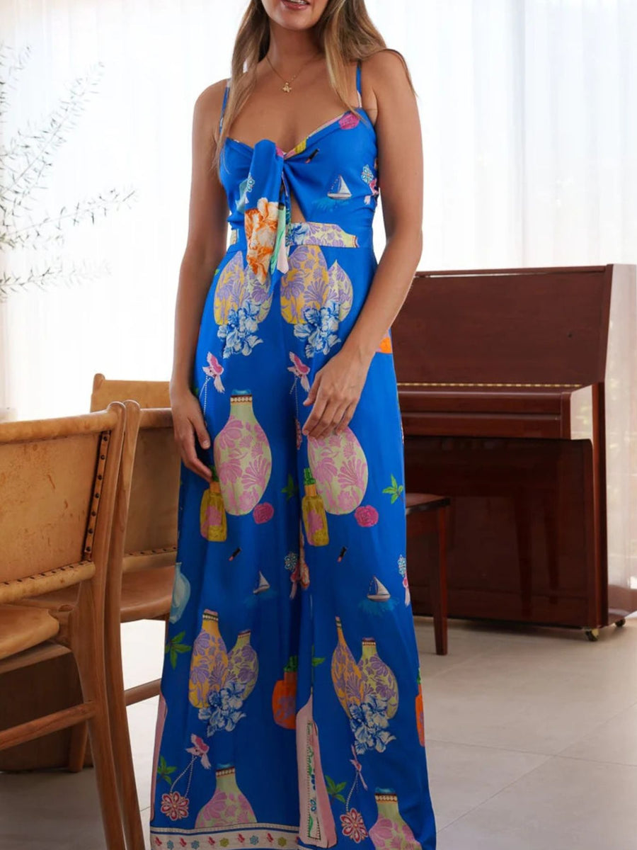 Blue wide-leg jumpsuit with tie-front, floral and vase print