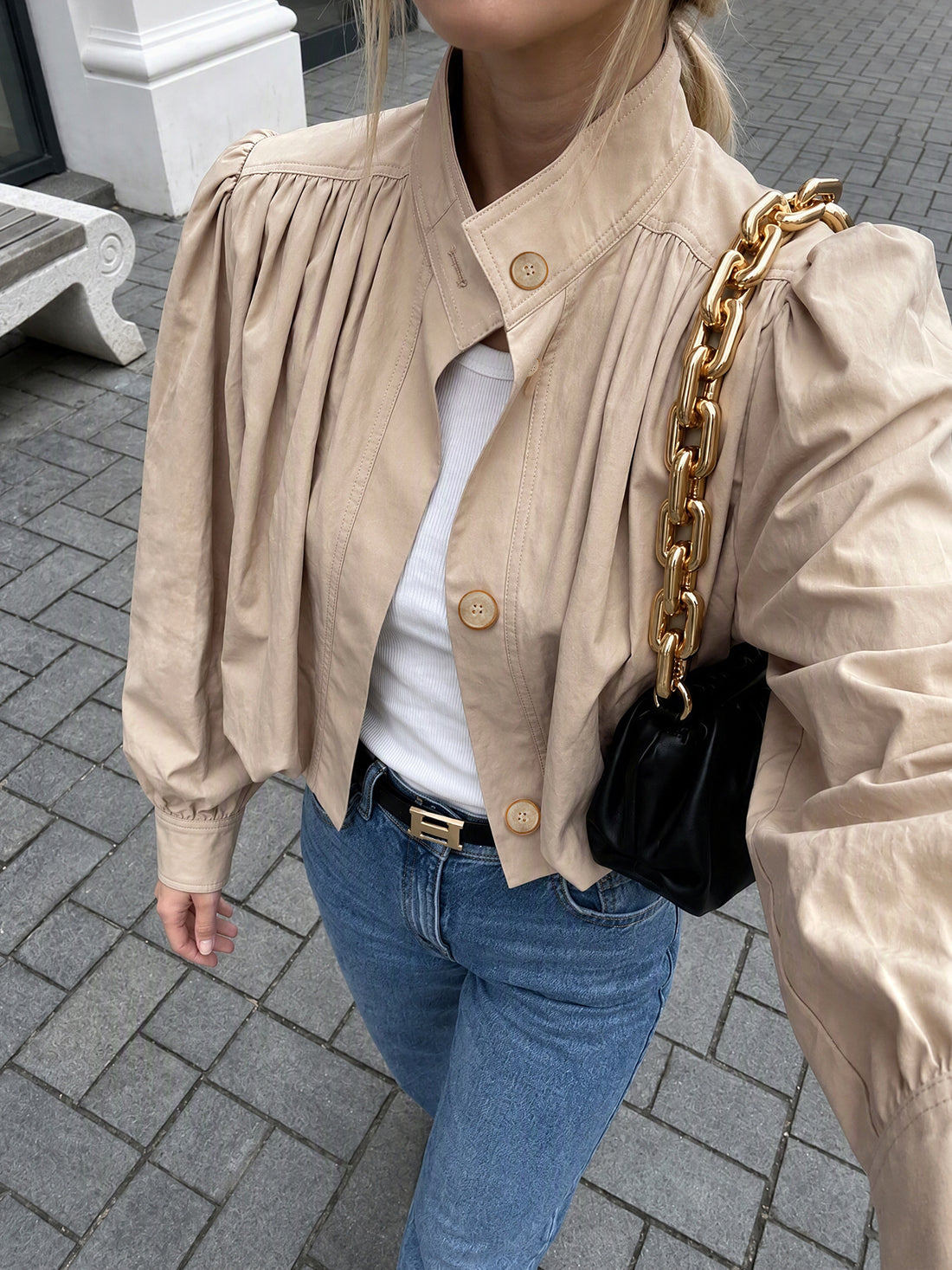 jacket in tan featuring buttoned and relaxed fit