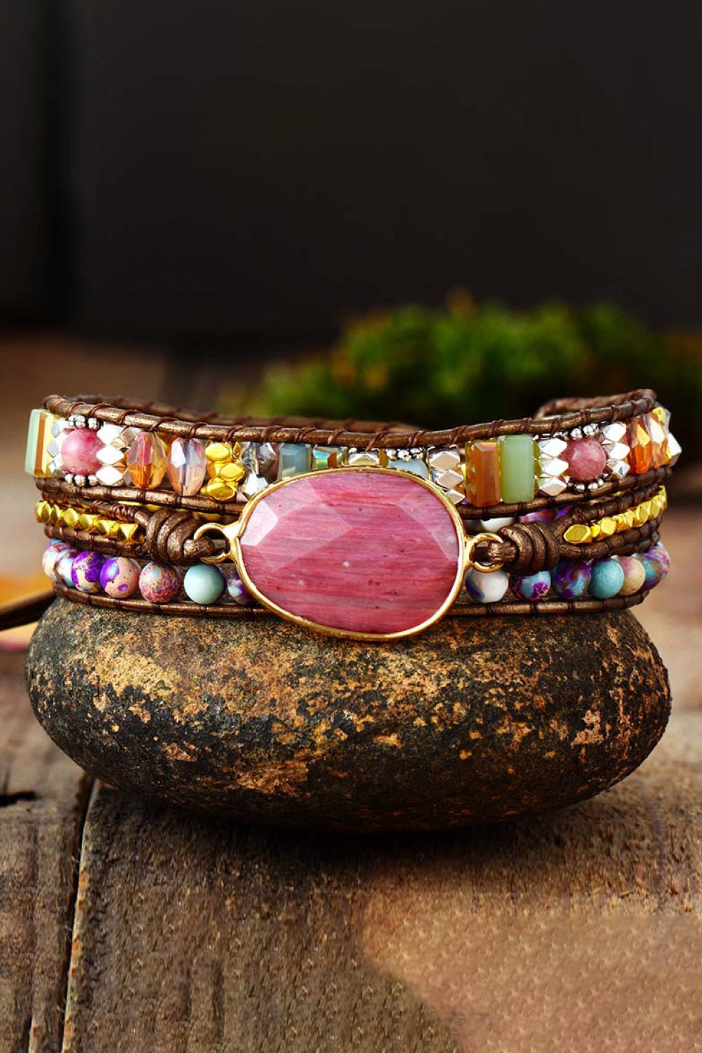 Bohemian wrap bracelet with pink stone and colorful beads on leather cord