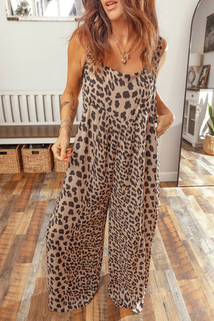 Chic leopard print wide-leg jumpsuit with square neckline and adjustable straps.