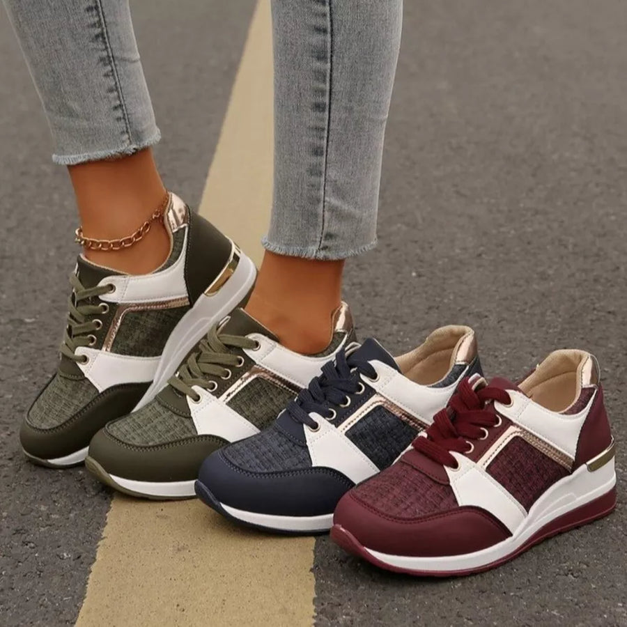 Textured lace-up sneakers in army green, dark blue, and burgundy with metallic accents and a chunky sole.