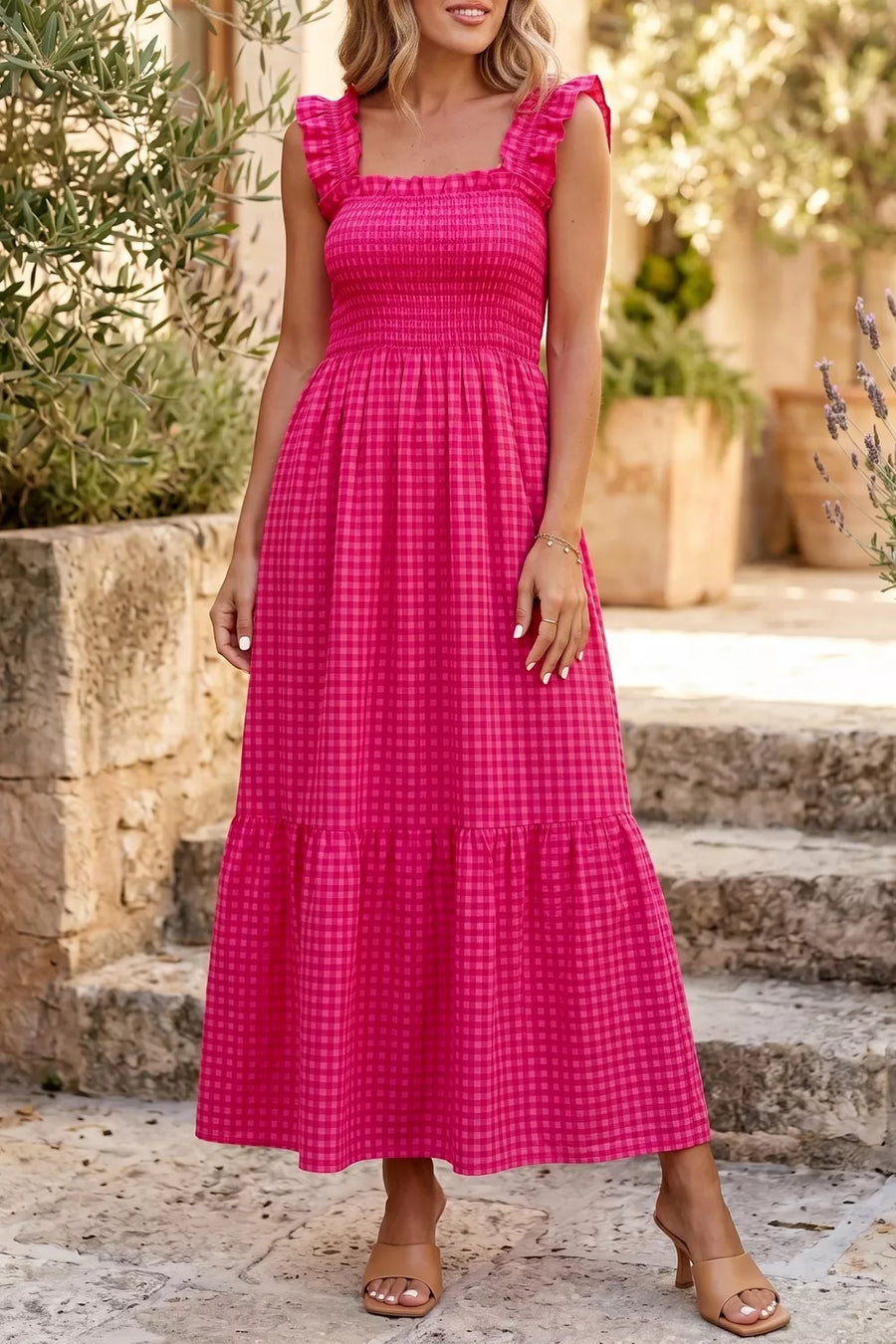 Charming plaid fit-and-flare sundress in deep rose cotton with smocked bodice and ruffled square neckline.