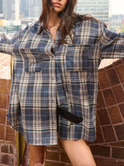 100% polyester Care instructions: Machine wash cold button-down shirt in brown with oversized silhouette