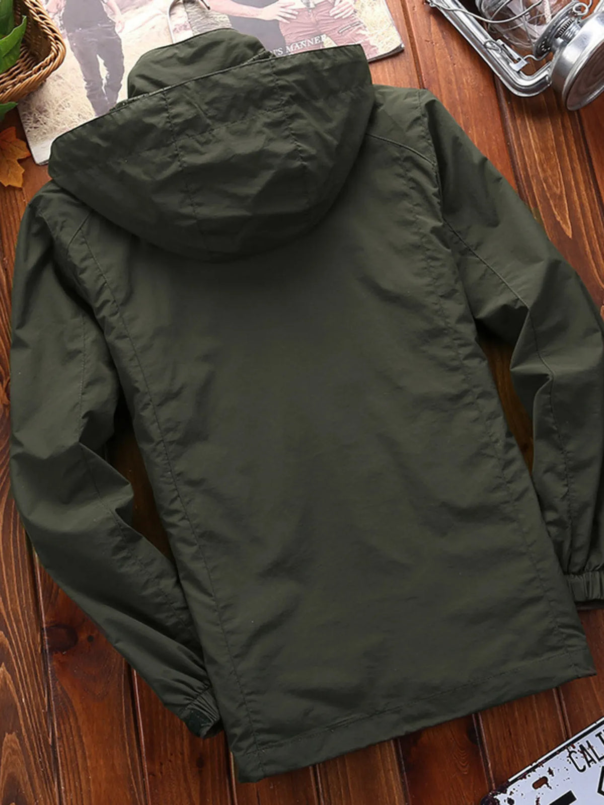 Men's Army Green hooded lightweight jacket with elastic cuffs.