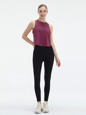 Maroon heathered athletic tank top with a high neckline and cropped hem, paired with black high-waisted leggings.