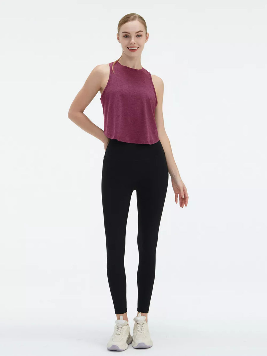 Maroon heathered athletic tank top with a high neckline and cropped hem, paired with black high-waisted leggings.