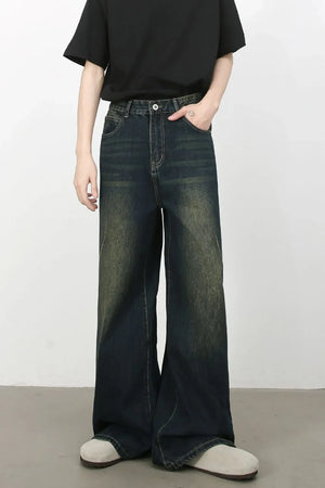 Faded wash palazzo jeans in dark denim with a wide leg and classic five-pocket styling.