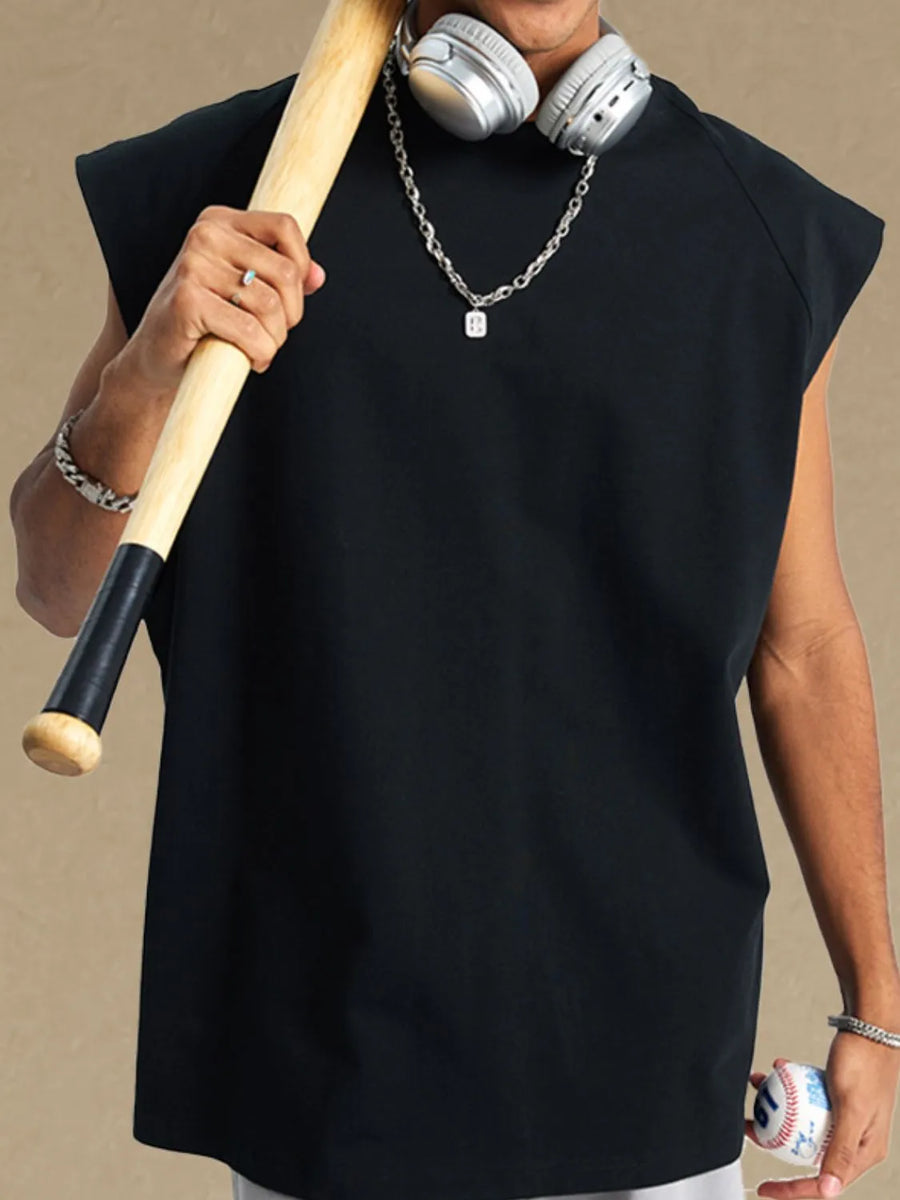 Black raglan shoulder sleeveless top with a relaxed fit.