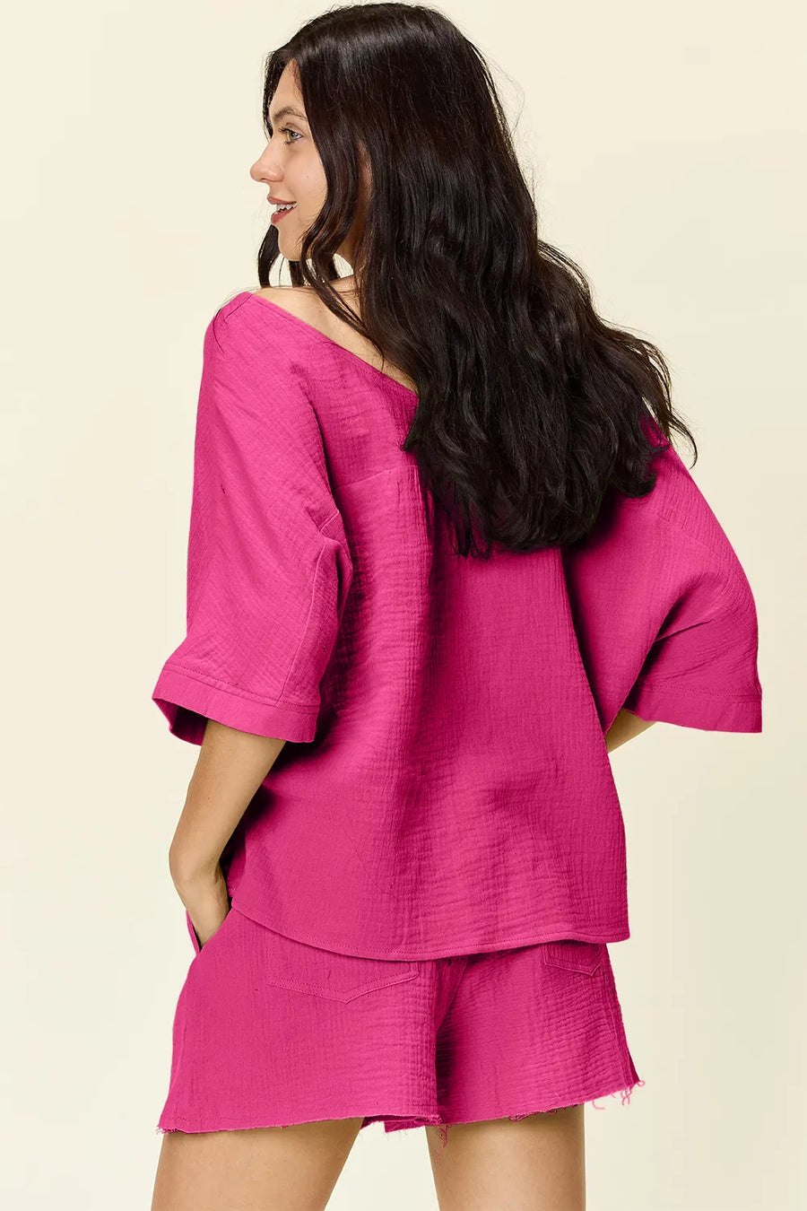 Textured cotton half sleeve top and drawstring shorts set in hot pink.