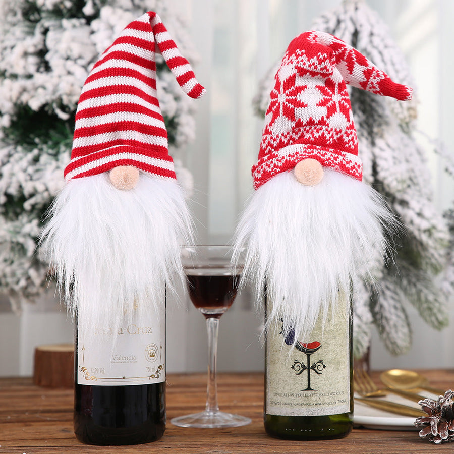 Festive gnome bottle toppers in red and white striped and snowflake patterns with white beards.