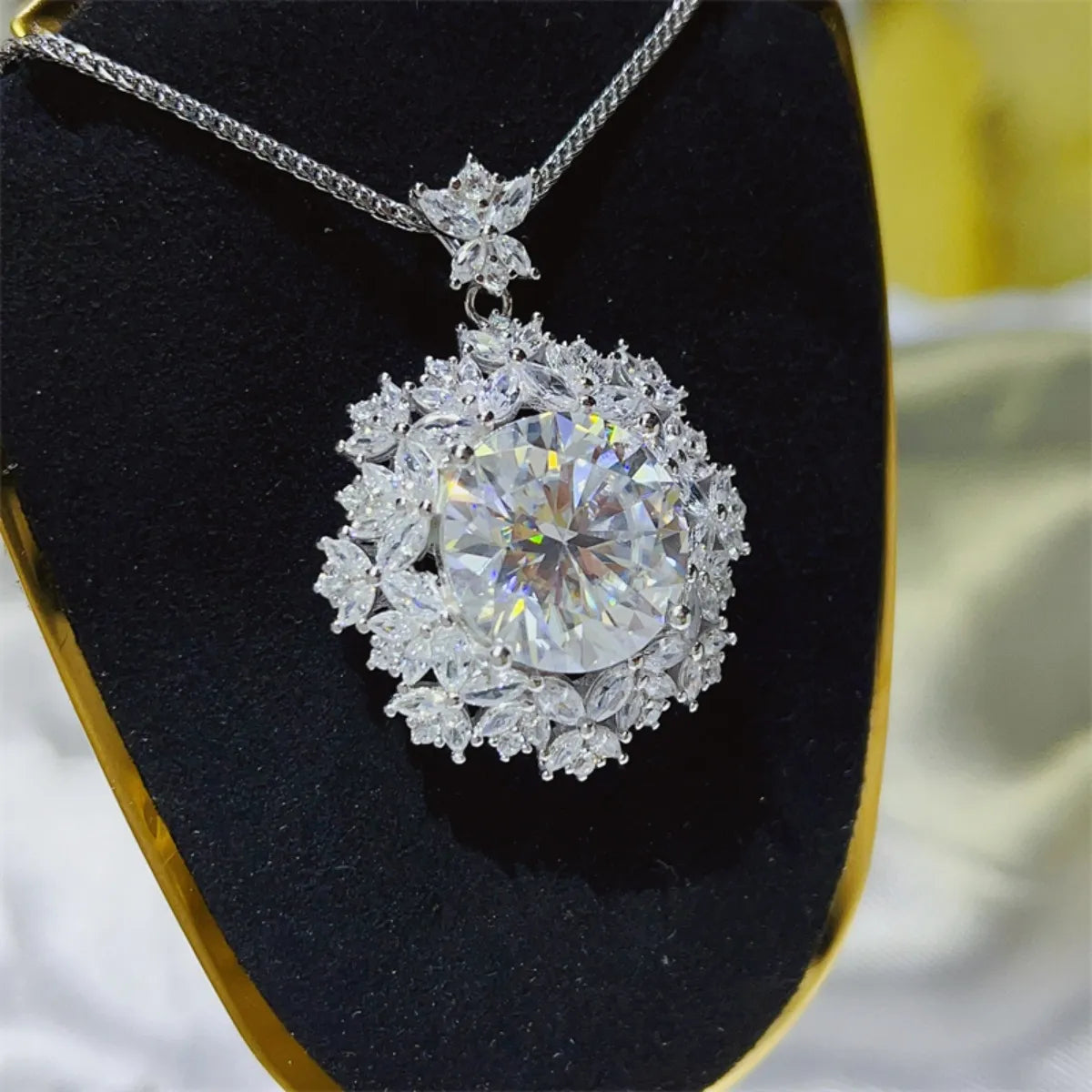 Radiant Cluster Pendant Necklace with large center stone and surrounding crystal accents.