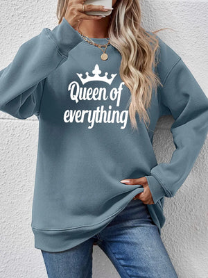 Misty Blue graphic sweatshirt with "Queen of Everything" text and crown detail.