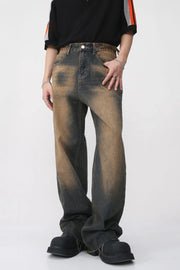 Faded wash wide leg jeans in dark denim with a distressed look.