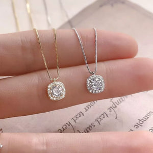 Elegant zircon pendant necklace in sterling silver, gold and silver box chains.
