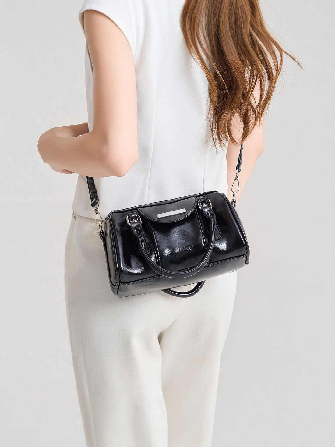 Elegant Patent Leather Mini Boston Crossbody Bag in black with top handle