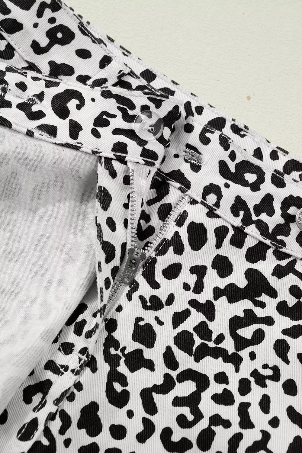 denim shorts in Leopard with leopard-print and decorative button