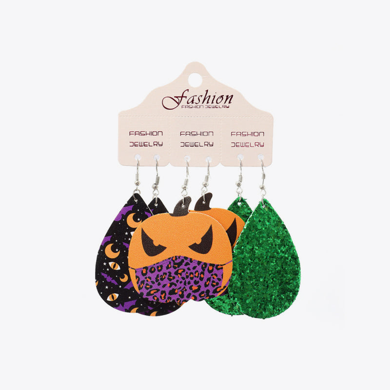 Halloween dangle earrings set with pumpkins and bats, featuring glitter and leopard print accents.